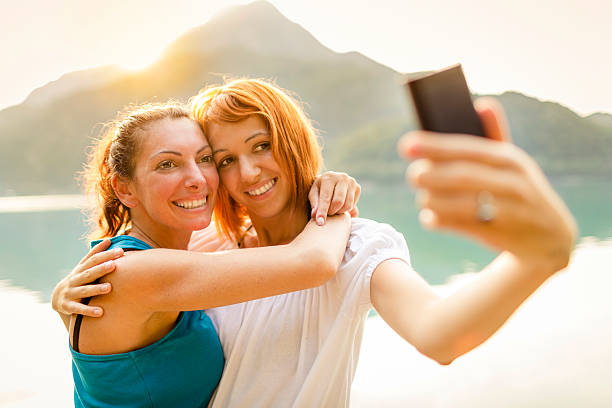 istock Two girls taking self photograph 155438241