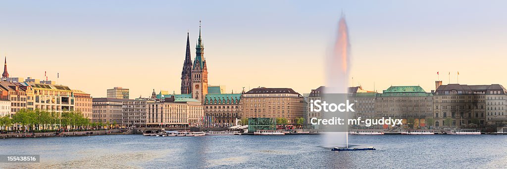 Hamburg Alster Lake panorama The Lake Binnenalster in Hamburg in Germany during spring time. In the foreground the famous Alster Lake fountain. Hamburg - Germany Stock Photo