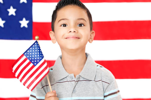 istock Little Boy Holding American Flag 155438540