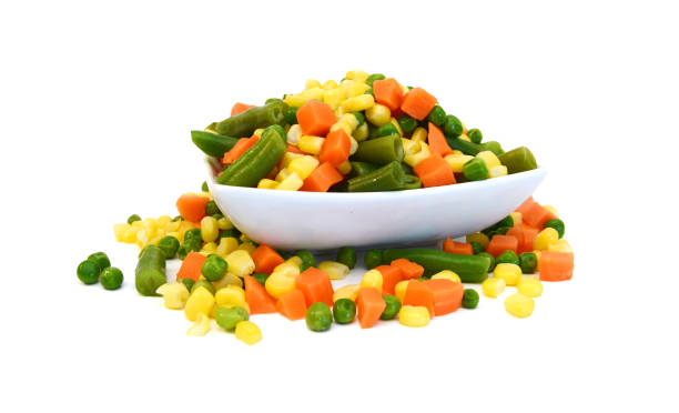 istock Fresh mixed vegetables on white. Golden mix. 1554387782