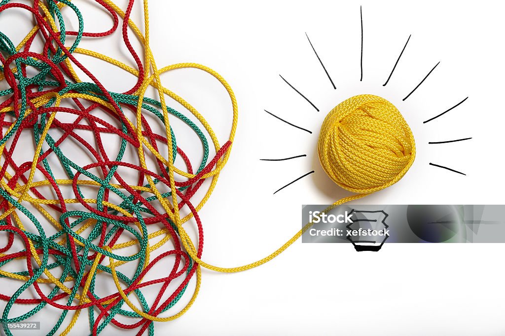 Yellow ball of wool with pen lines like lightbulb  Complexity Stock Photo