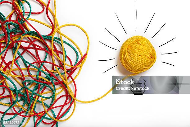 Yellow Ball Of Wool With Pen Lines Like Lightbulb Stock Photo - Download Image Now - Complexity, Light Bulb, Thread - Sewing Item