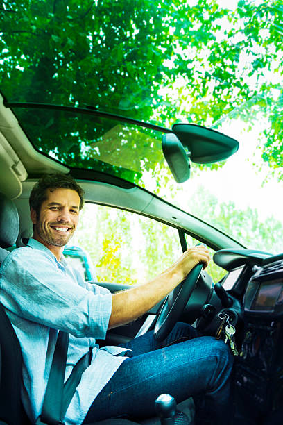 istock Cheerful driver in his car 155439552
