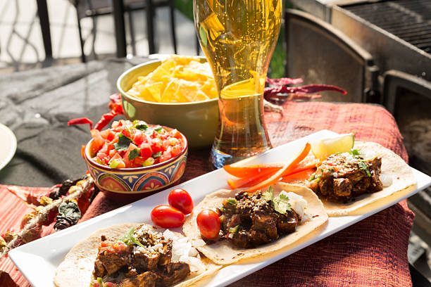 istock Mexican Grilled Chicken Tacos, Beer and Fire 155439641
