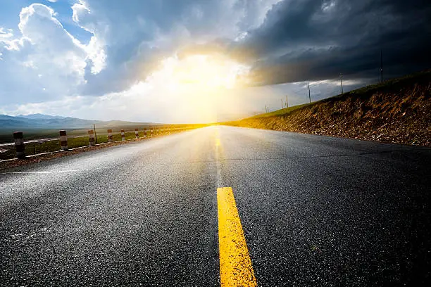 Photo of road thunderstorm