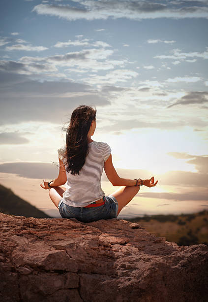 istock yoga in the nature sunset 155439947