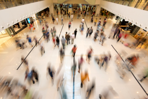 Busy scene with shoppers on escalators inside the Bullring Shopping Mall in Birmingham, West Midlands, UK on 23 July 2023