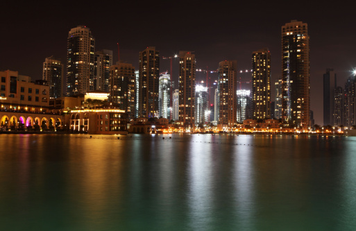 Dubai Marina in the night. Panoramic view from gulf.
