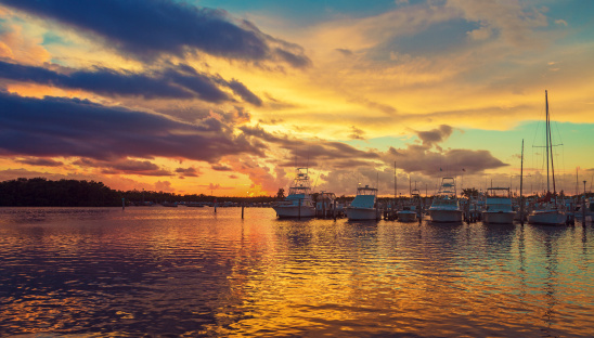 view of a boat marina in miami , florida at sunset