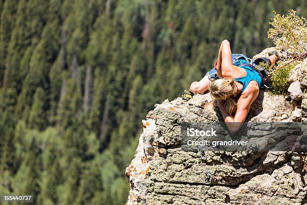 Female Mountain Climber On A Rock Face Stock Photo - Download Image Now - Achievement, Activity, Adult