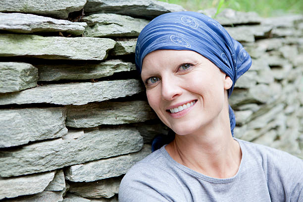 Beautiful young woman with cancer smiling