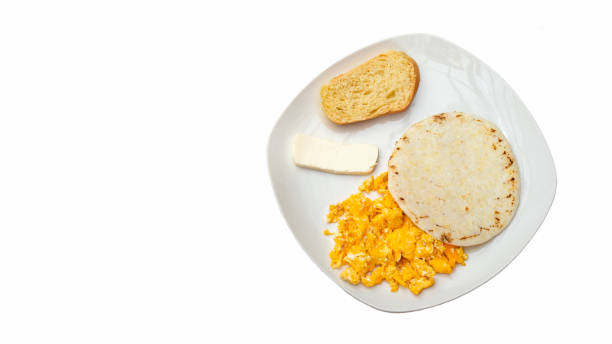 istock Arepa with cheese, egg and bread - Traditional Colombian breakfast 1554407525