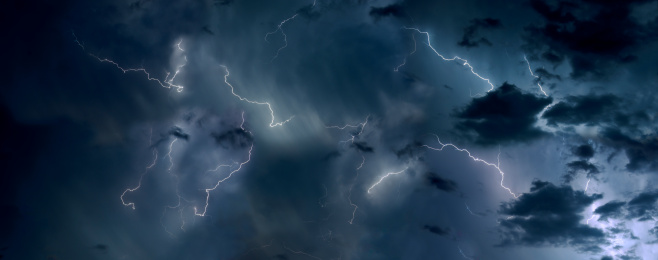 Dramatic sky full of lightnings.