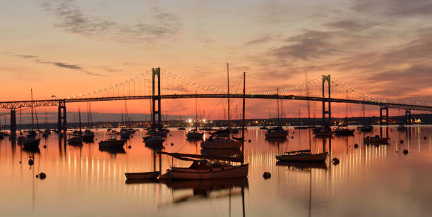 Newport Bridge at Sunrise Newport Bridge at sunrise, Jamestown, Rhode Island, USA newport rhode island stock pictures, royalty-free photos & images