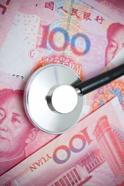 istock Stetroscope on Chinese Yuan Note Currency 155440933