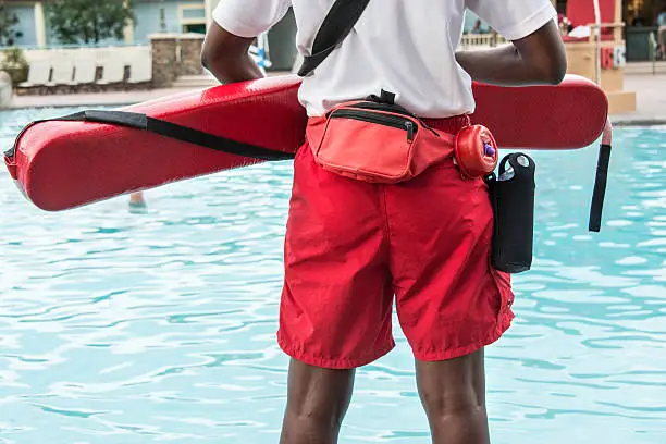 Lifeguard watching a swimming pool