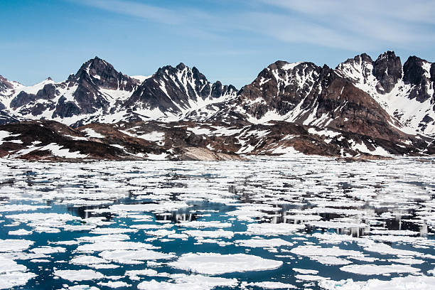 Sea Ice Sea ice breaking up in spring. Near Kulusuk, Greenland. icecap photos stock pictures, royalty-free photos & images