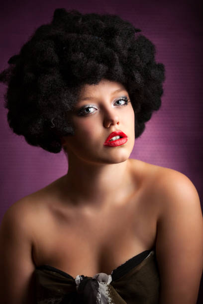 istock Young Woman With Afro Wig 155441481