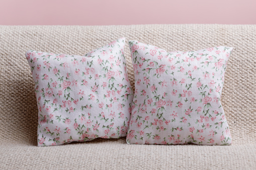Cushions with flower pattern on sofa