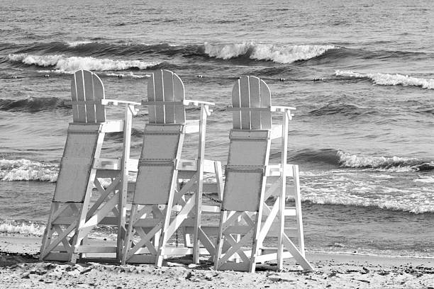 Beach Lifeguard Chairs Ocean Surf stock photo