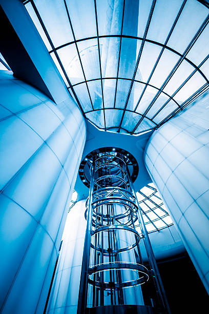 futuristic elevator futuristic elevator in the modern Architecture construction skyscraper machine industry stock pictures, royalty-free photos & images