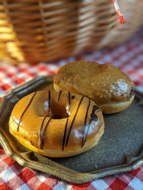 istock close up of doughnut on the table 1554416675