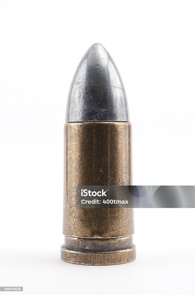 Large caliber 9mm bullet Large caliber 9mm bullet with a white background. Bullet Stock Photo