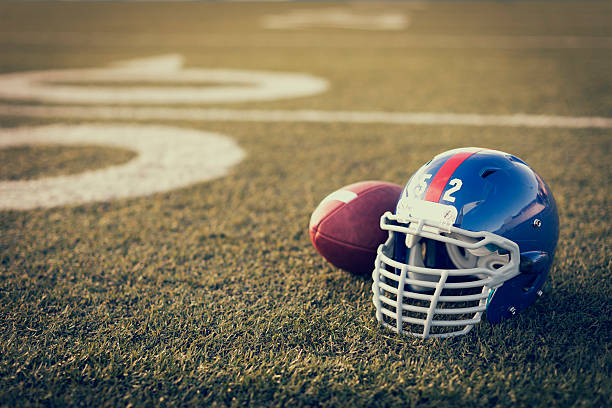 американский футбол шлем - blue helmets стоковые фото и изображения