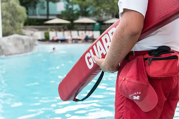 Lifeguard watching a swimming pool