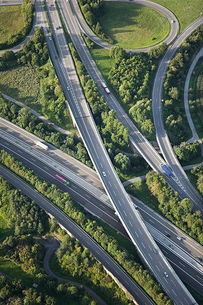 istock Aerial view of highways through green nature 155442396