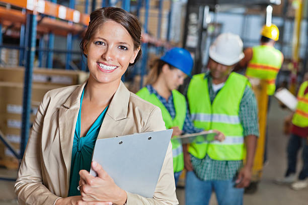 istock Happy manager in shipping and distribution warehouse facility 155442732