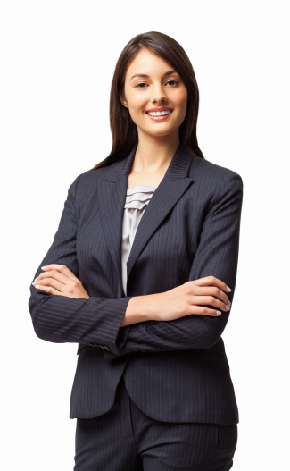 Portrait of an elegant young female entrepreneur standing with arms crossed. Vertical shot. Isolated on white.