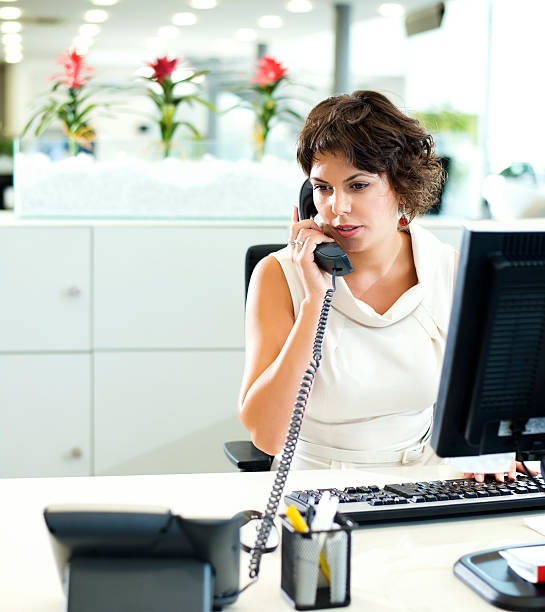 istock Woman making a phone call in the office 155443849