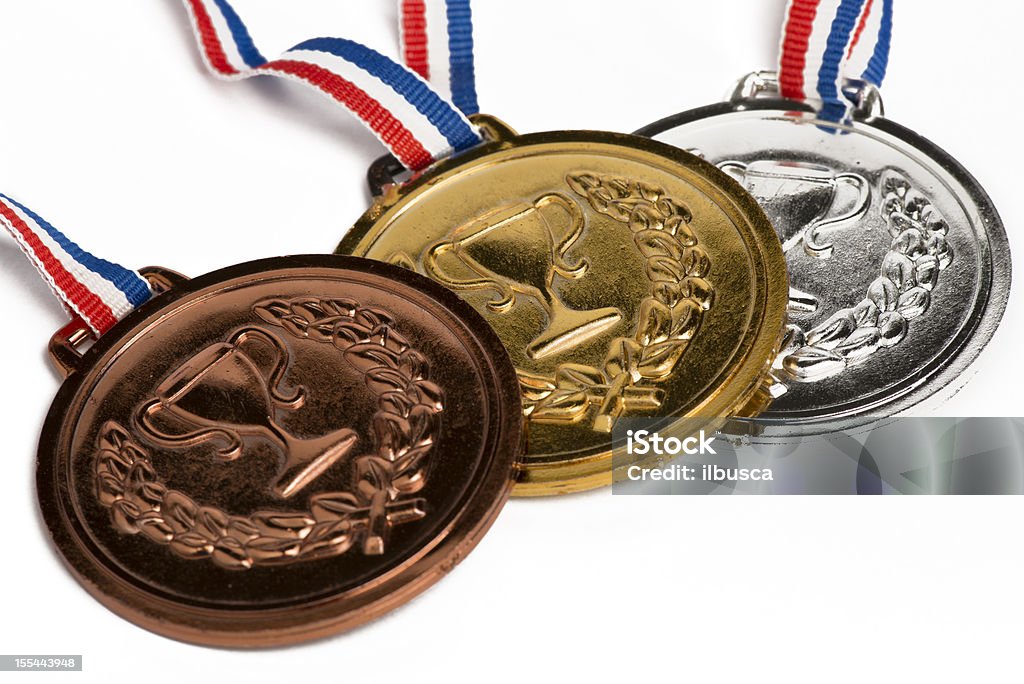Olympische-Medaillen isoliert auf weiss - Lizenzfrei Internationales Sportereignis Stock-Foto