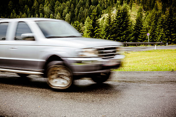 istock Car moving fast on a mountain road 155444432