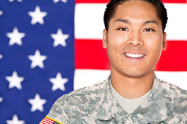 istock American Soldier in Army Camouflage Uniform 155444612