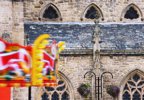St Nicholas Church, Marketplace, Durham, England. A roundabout is spinning.