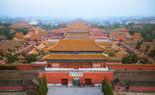 Gray, foggy and polluted day at the North-East corner tower outside the Forbidden City in central Beijing.