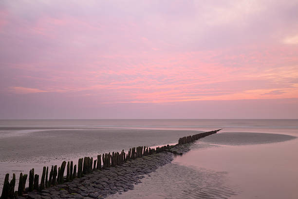 Beach Sunset At North Sea stock photo
