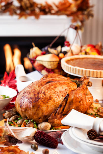 istock Thanksgiving Dinner with Stuffed Turkey and Side Dishes 155445461