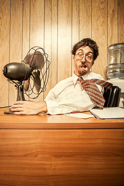 istock Business Man in Office With Fan 155445463