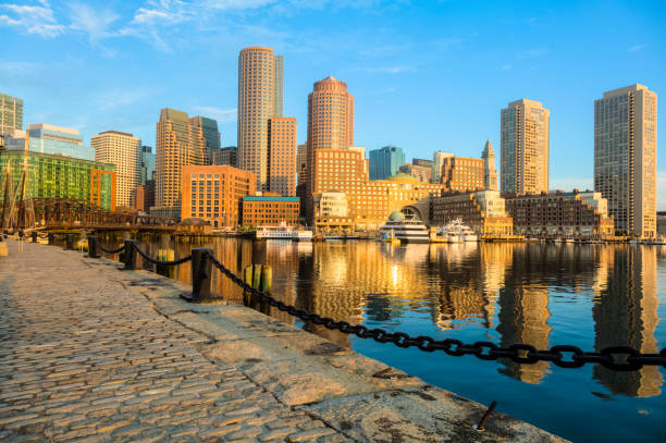 istock Boston Sunrise With Skyscraper Reflections on Glassy Harbor 155445540