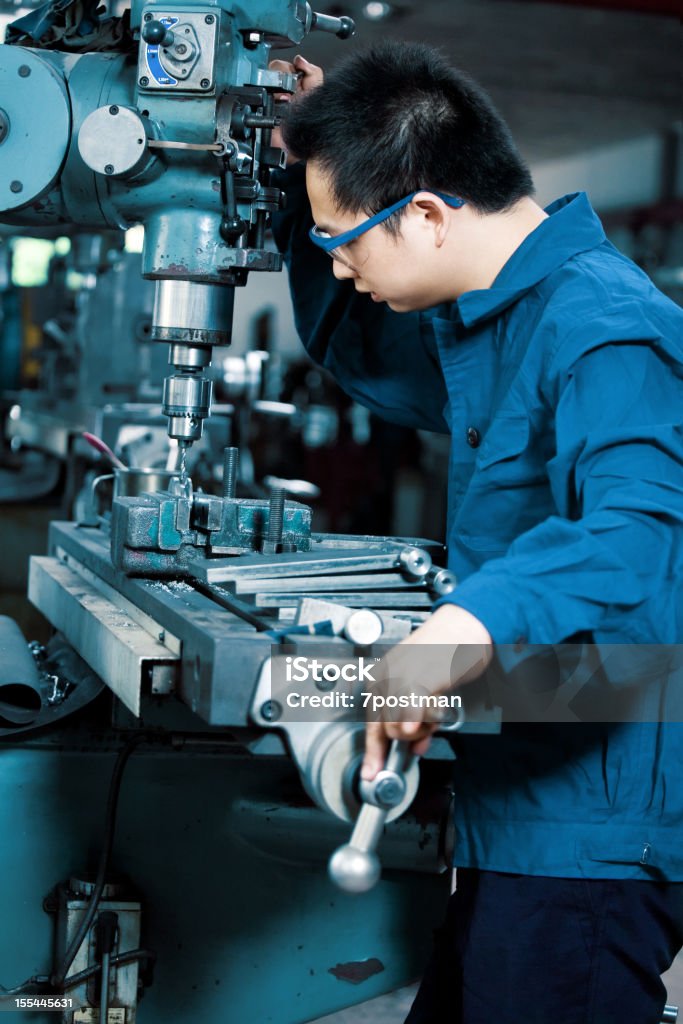 Man Using Precision Tools Man In Workshop Using Drill Stock Photo - Download Image Now ...