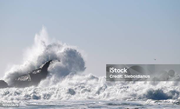 Big Wave Braking At Rock In Half Moon Bay California Stock Photo - Download Image Now