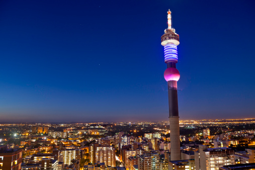 Hillbrow tower in Johannesburg city, seen at sunset towards the northern suburbs. A highly urban populated area in Johannesburg.