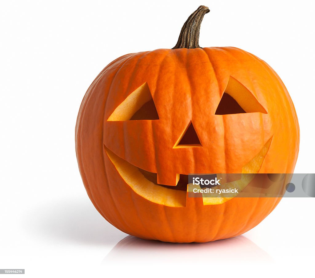 Freshly Carved Jack-o-Lantern Pumpkin Isolated on White Jack-o-lantern isolated with shadow and reflection. Clipping path provided. Pumpkin Stock Photo