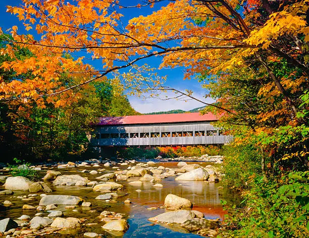 Photo of covered bridge, stream, autumn, Hew Hampshire