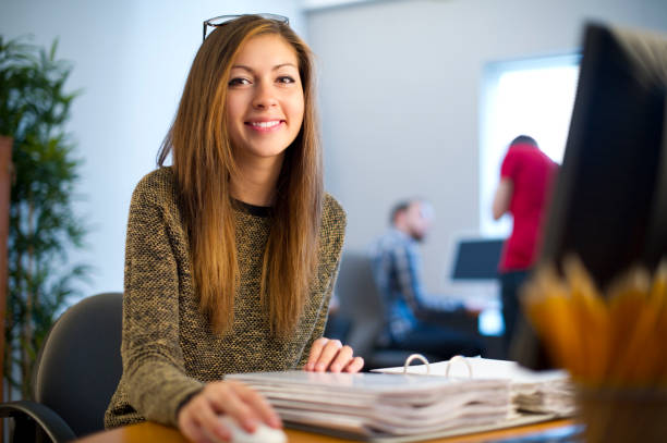 young female office worker  school receptionist stock pictures, royalty-free photos & images