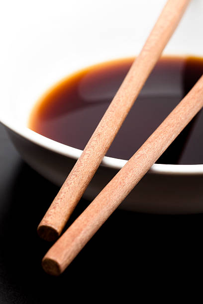 istock Bowl of soy sauce and chopsticks 155446462