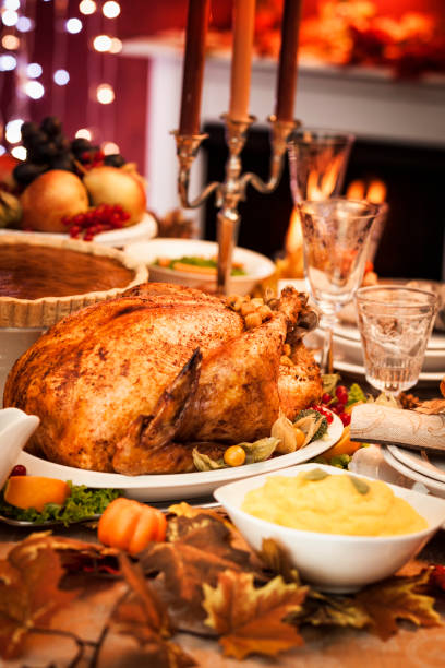 istock Thanksgiving Dinner with Stuffed Turkey and Side Dishes 155446584
